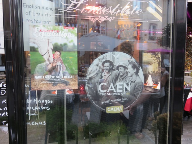 Commemorative decals were placed in several store and restaurant windows in honor of the 70th anniversary of the D-Day landings during WWII.